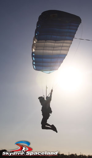 Skydiver flying a parachute