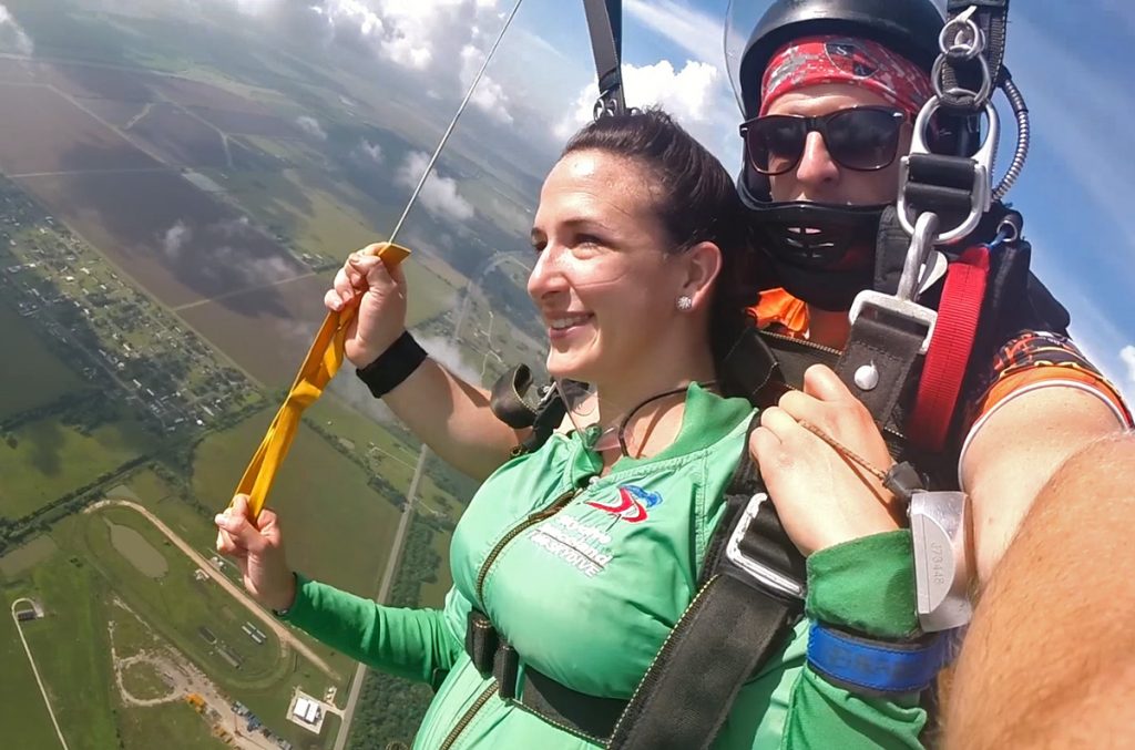 Tandem skydiver helping fly the parachute. Photo by Braden Smith