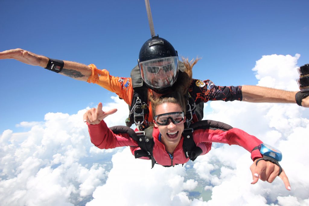 Tandem skydiving pair in freefall over Skydive Spaceland Florida