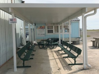 Covered loading area lets Skydive Spaceland Florida jumpers plan exit order in the shade.